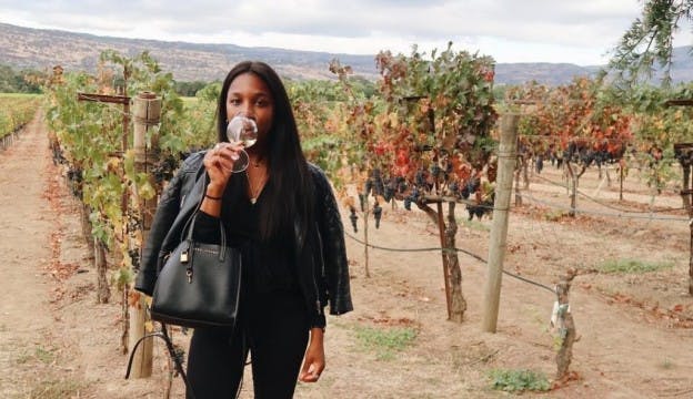 Naomi Walkland in a vineyard