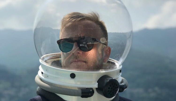 Ted Gushue in an astronaut helmet